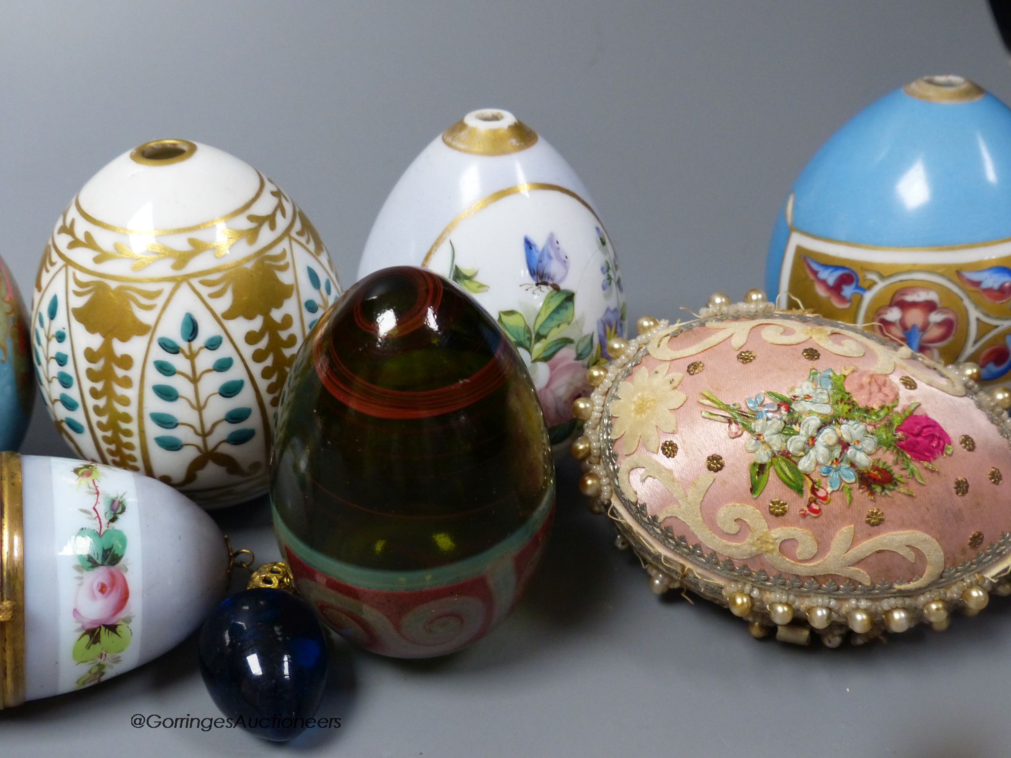 Assorted 19th/20th century Russian painted and gilded porcelain Easter eggs